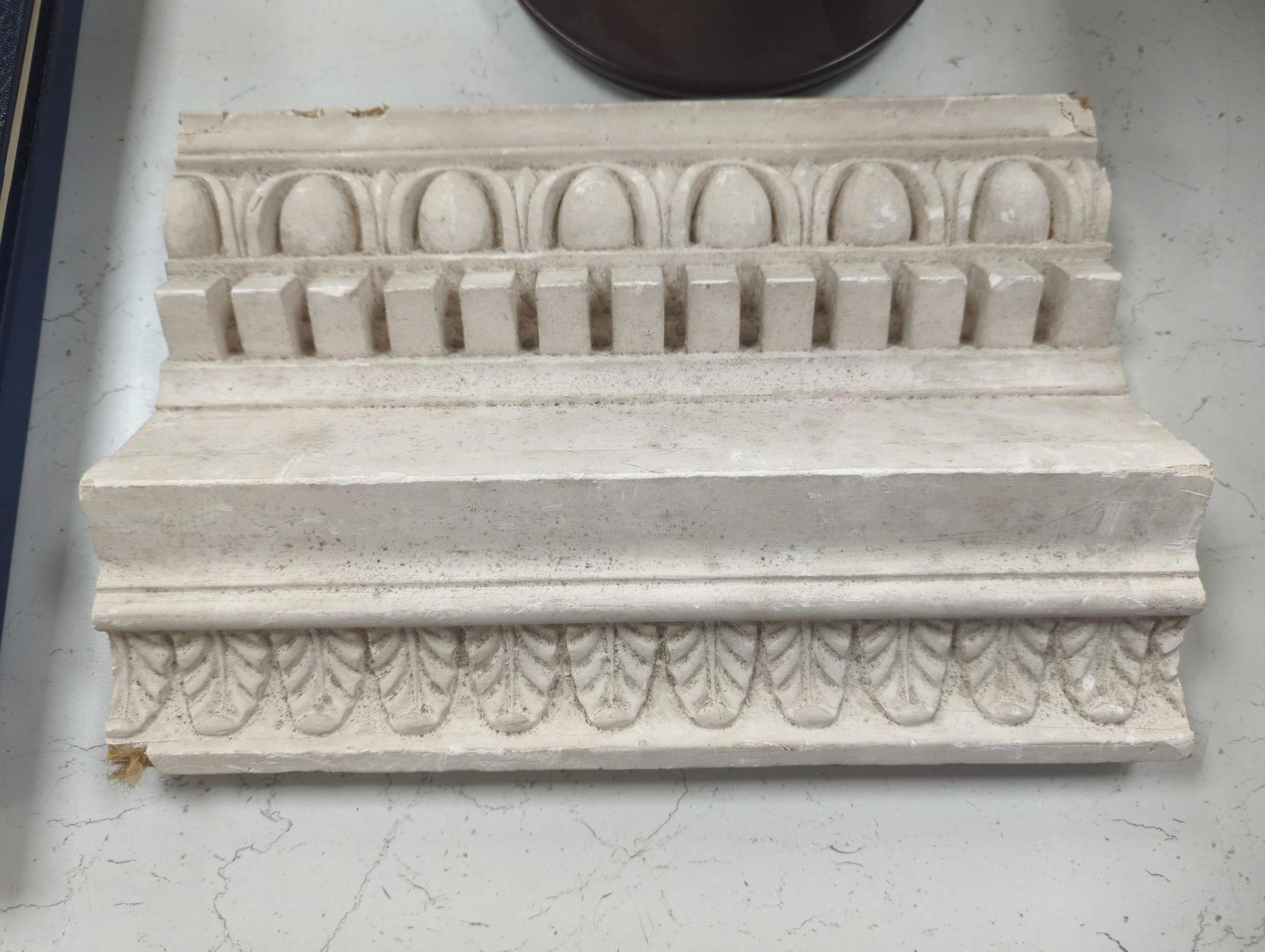 A small wood model spiral staircase together with a section of plaster frieze work (2) 37cm